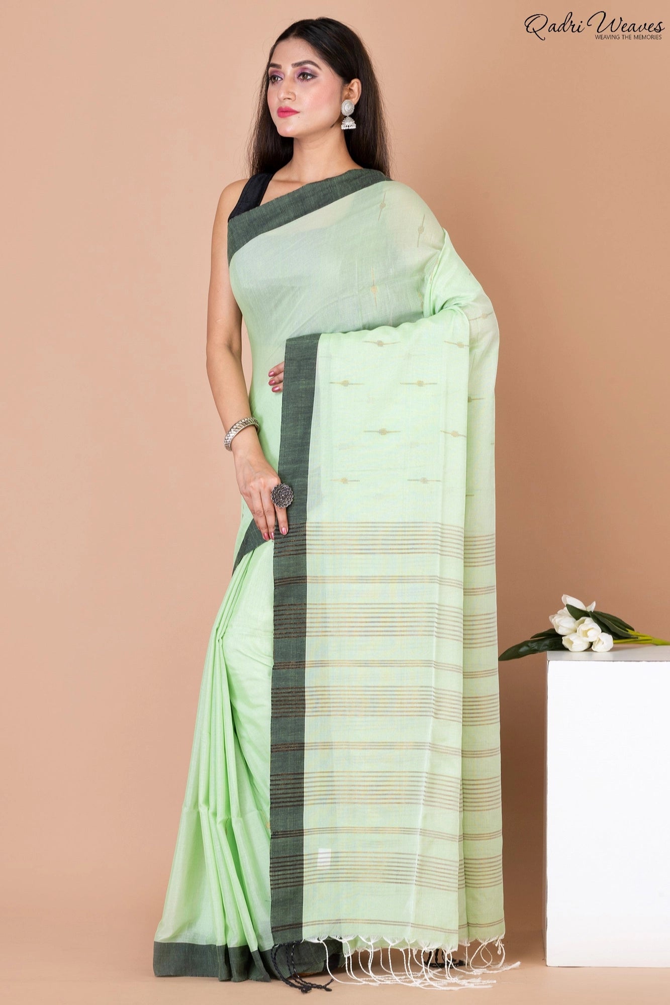 Handloom Pastel Green Khadi Silk Saree with Black Border