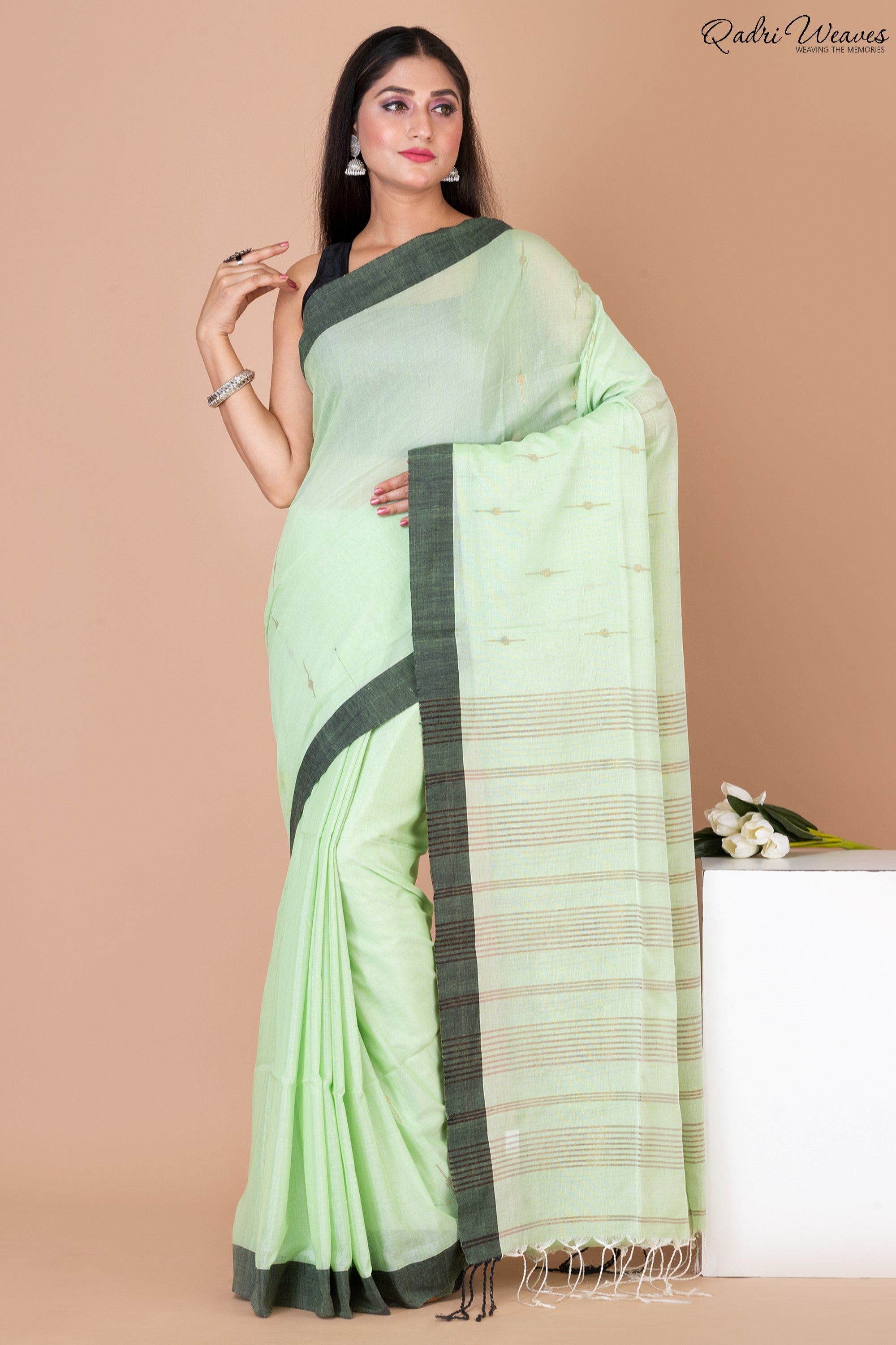 Handloom Pastel Green Khadi Silk Saree with Black Border