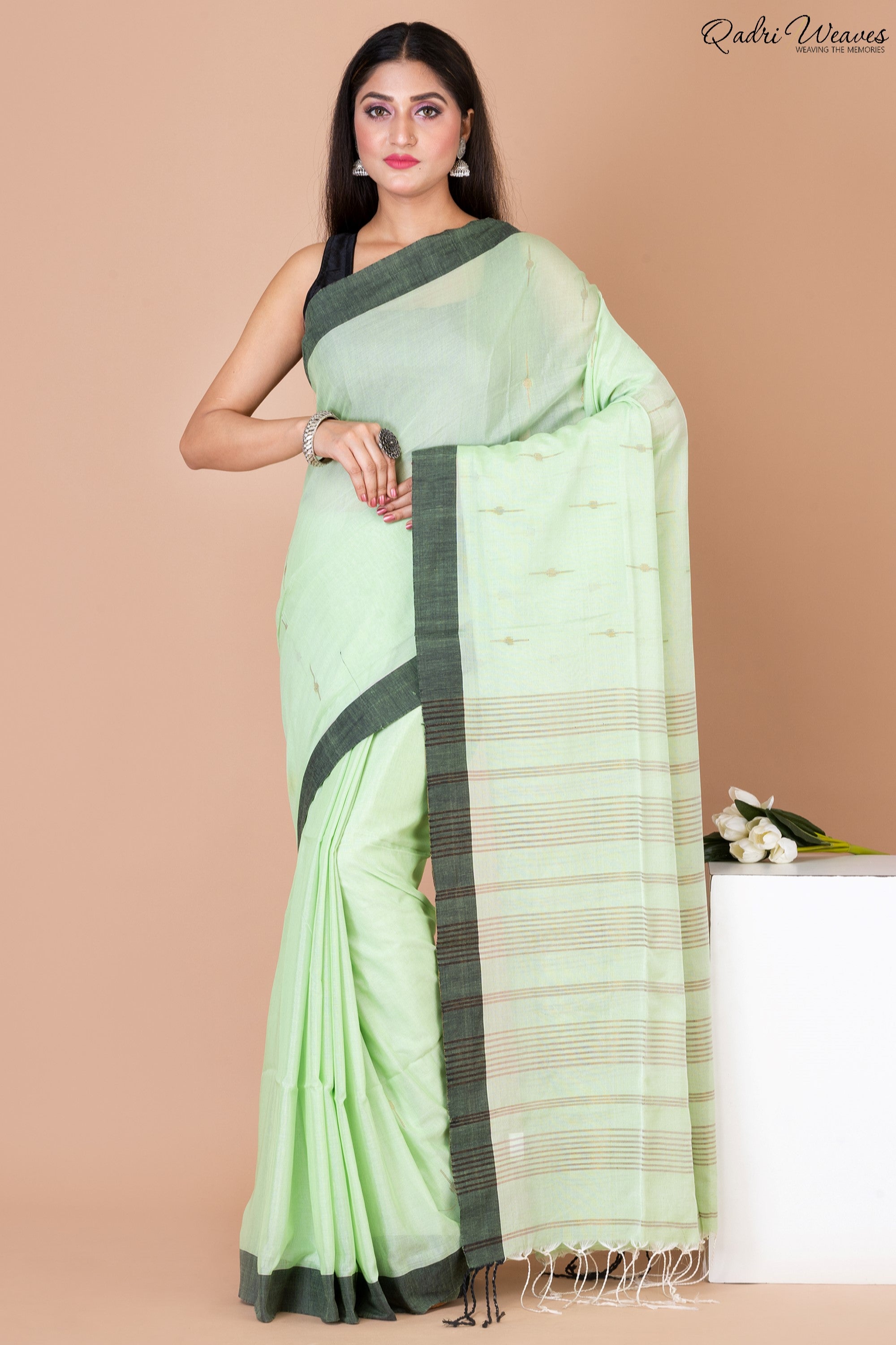 Handloom Pastel Green Khadi Silk Saree with Black Border